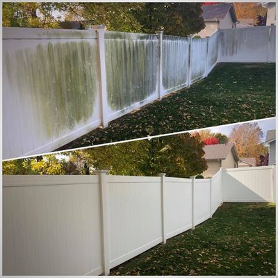 A vinyl fence before and after cleaning, green algae removed