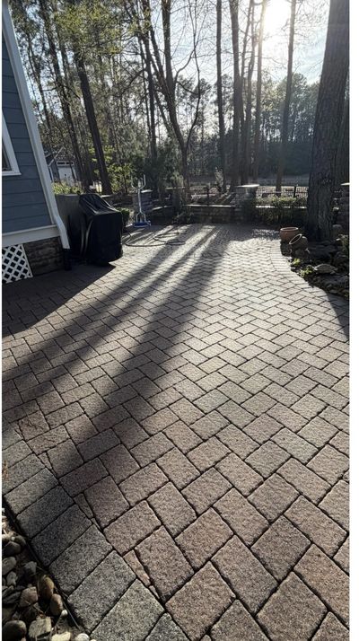 Same paver patio after cleaning, pavers restored to their natural color